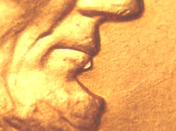 2006-P--LMC-Die-Break/Chip-Under-Lip-Of--Lincoln?